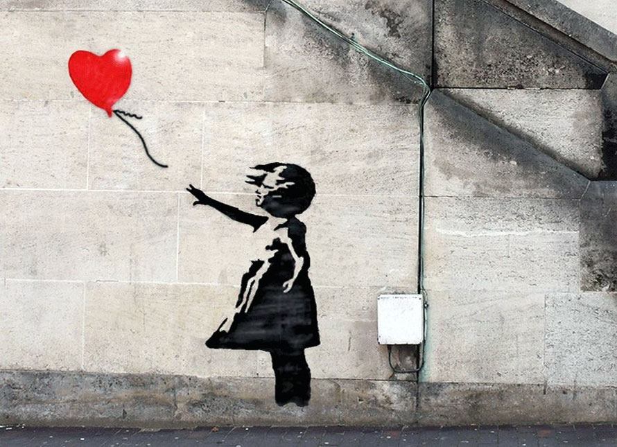 Ραγίζει καρδιές: Το πιο διάσημο γκράφιτι του κόσμου προσβλήθηκε από κορωνοϊό